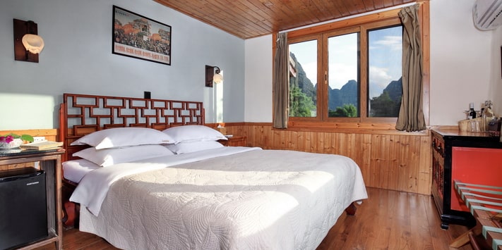 Yangshuo Mountain Retreat private balcony overlooking the Yulong River.