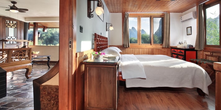 Yangshuo Mountain Retreat Yulong River corner room with oversize balcony.